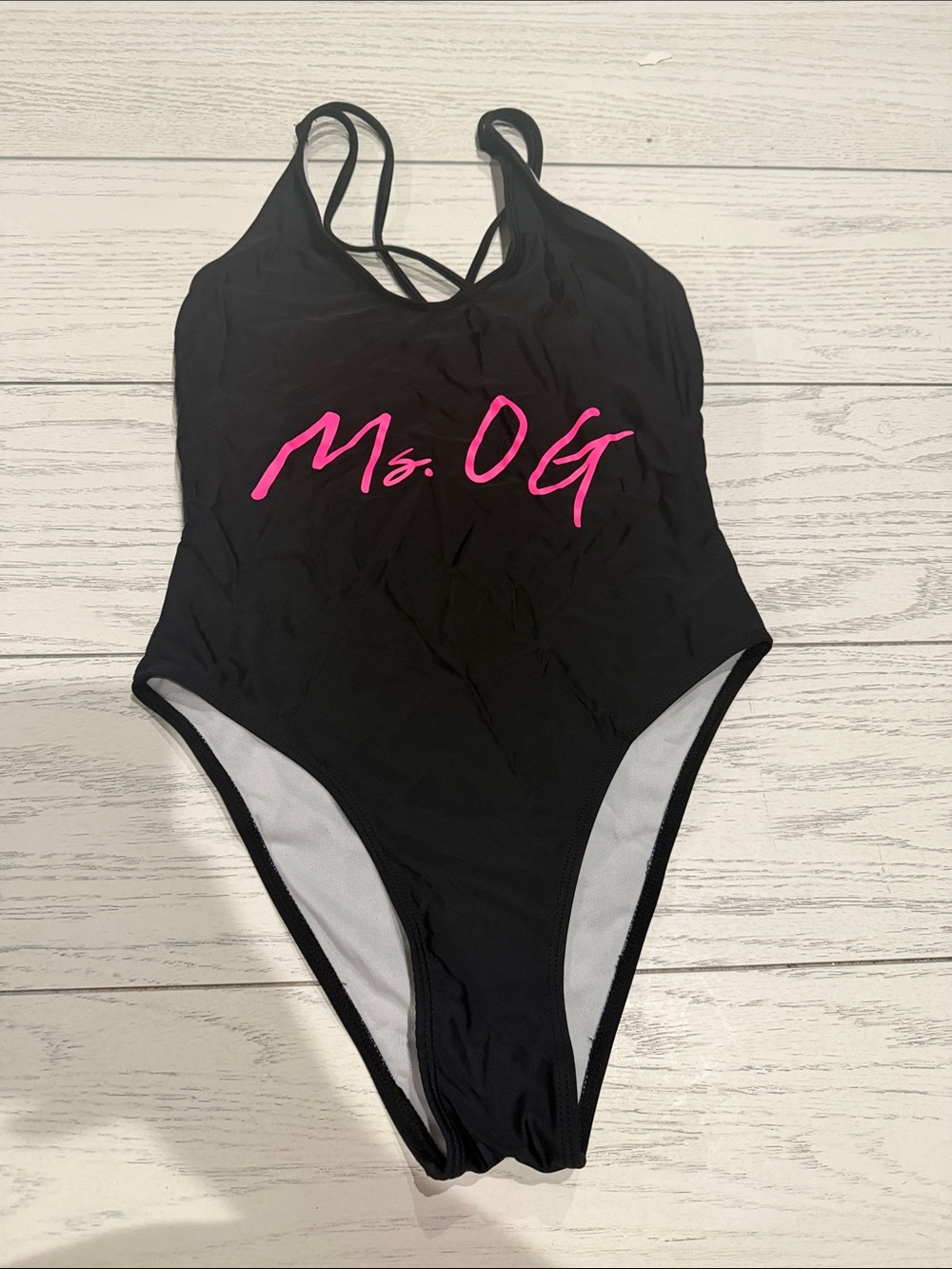 Black One-Piece Swimsuit with Pink "Ms. OG" Script